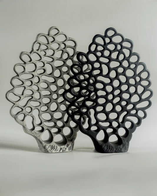 Black and gray metal sculpture on a white background metal coral sculputre with a gradient effect and a unique, organic design on a gray background
Coral - premium organic metal sculpture for luxury home interiors by OLKAP