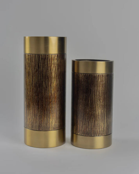 Two cylindrical metal vases with gold and bronze finish on a gray background
Olympus - designer cylindrical metal accent for contemporary home decor by OLKAP